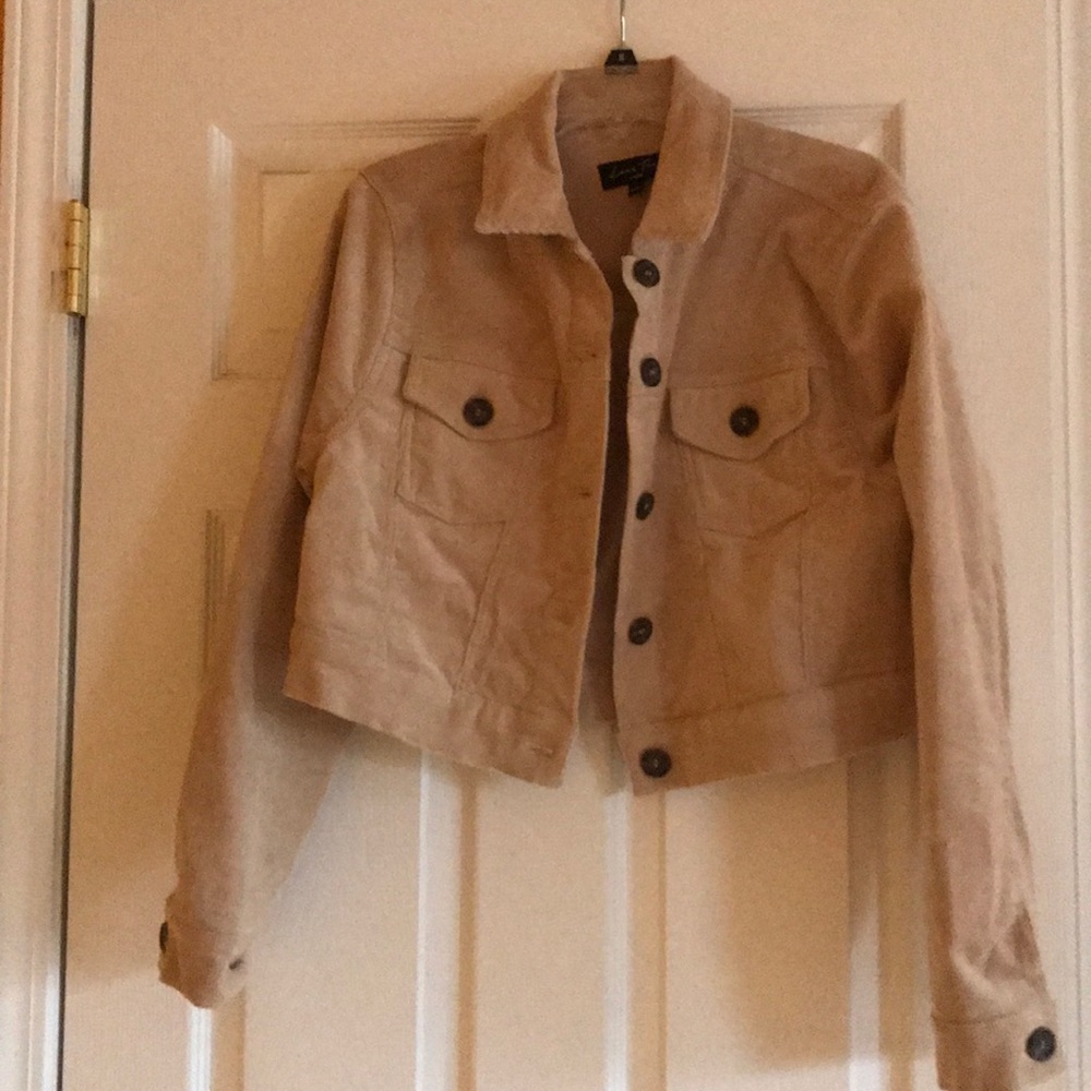 Cropped corduroy and tan jacket.